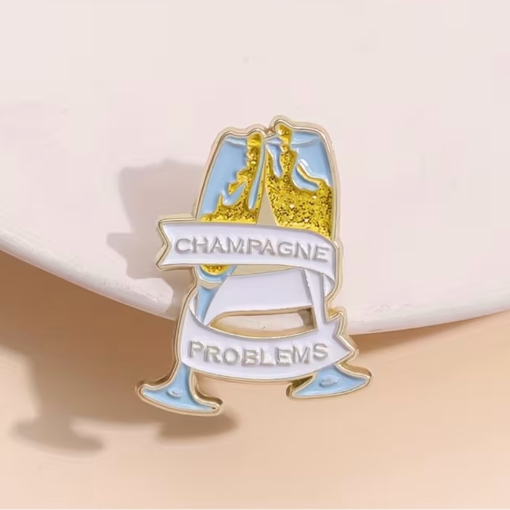 🎁Taylor Swift Inspired Champagne Problems Enamel Pin
